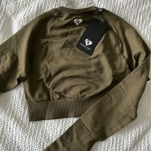 NEVER WORN WOMENS BEST